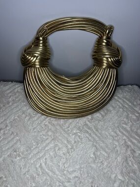 Gold women’s handbag